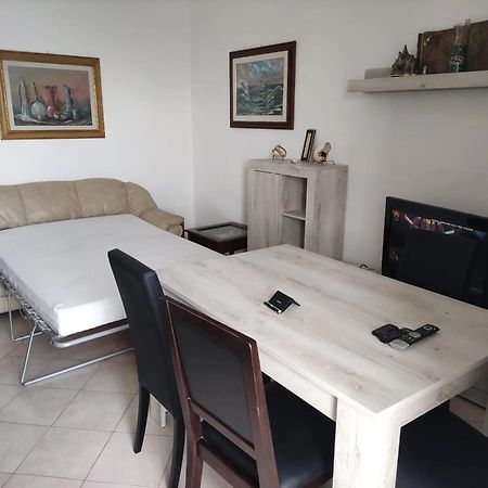 Seaside Haven: Porto Santo Stefano Apartment with Beach Access Exterior photo
