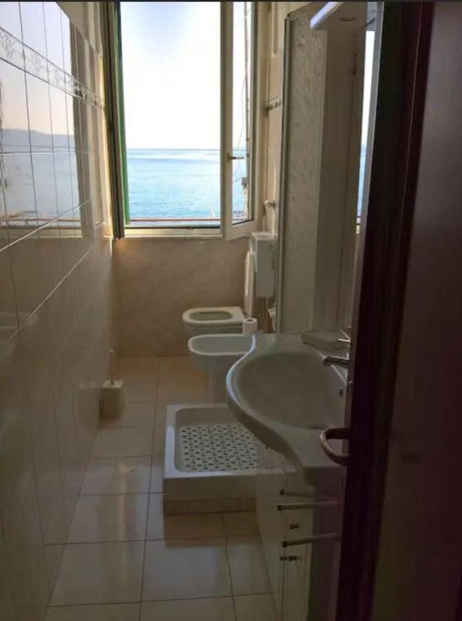 Seaside Haven: Porto Santo Stefano Apartment with Beach Access Exterior photo