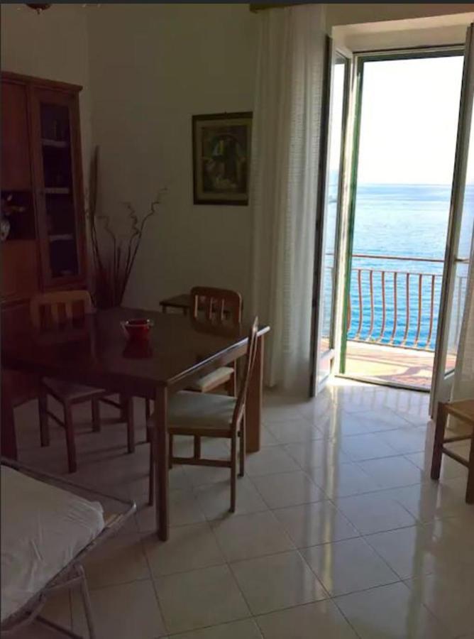 Seaside Haven: Porto Santo Stefano Apartment with Beach Access Exterior photo